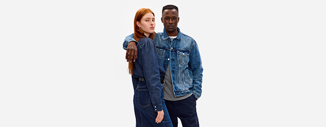 Couple posing in denim wear